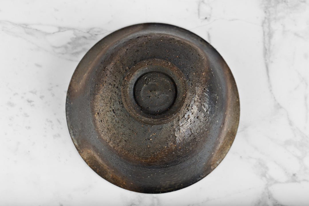 les reflets du coté brut sont très beaux, et le fond du bol de ce coté est en forme "escargot"